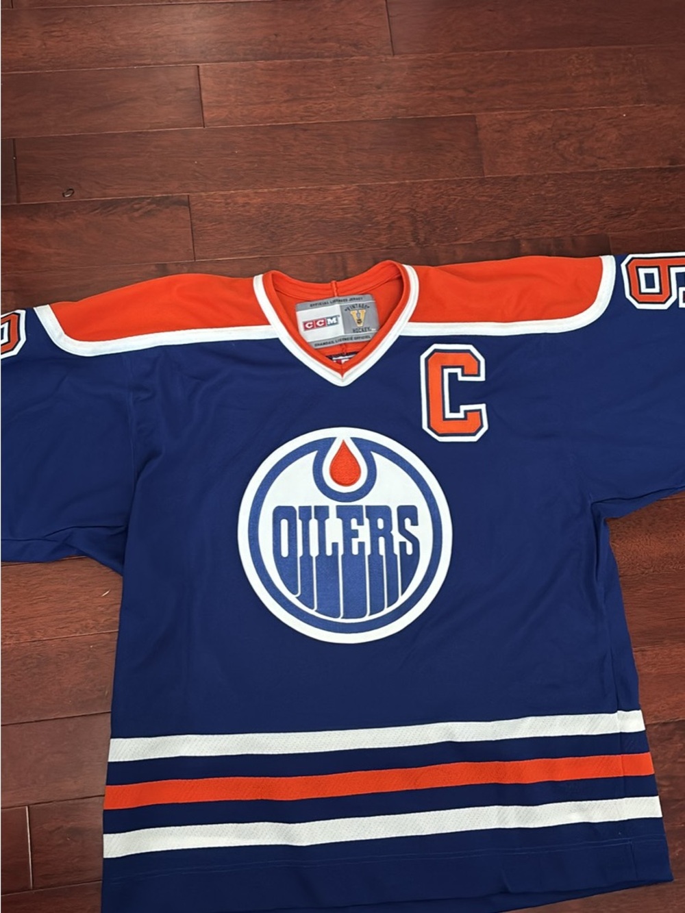 CCM Edmonton Oilers Navy Blue & Orange Hockey Jersey with Captain C
